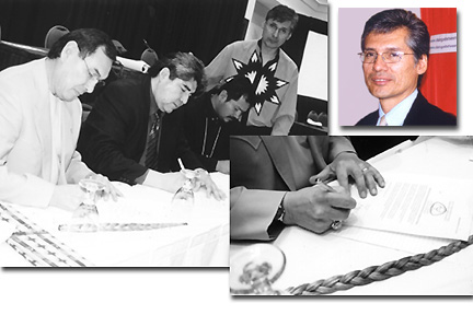 Wilton Littlechild, Ted Moses, Antonio Vargas, Matthew Coon Come Signing the Declaration of the Indigenous Peoples Summit of the Americas 2001